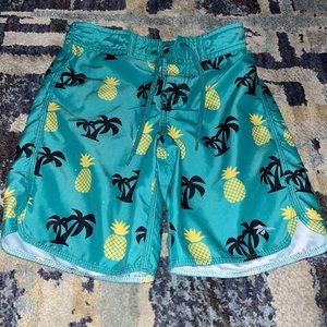 Green pineapple swimming trunks